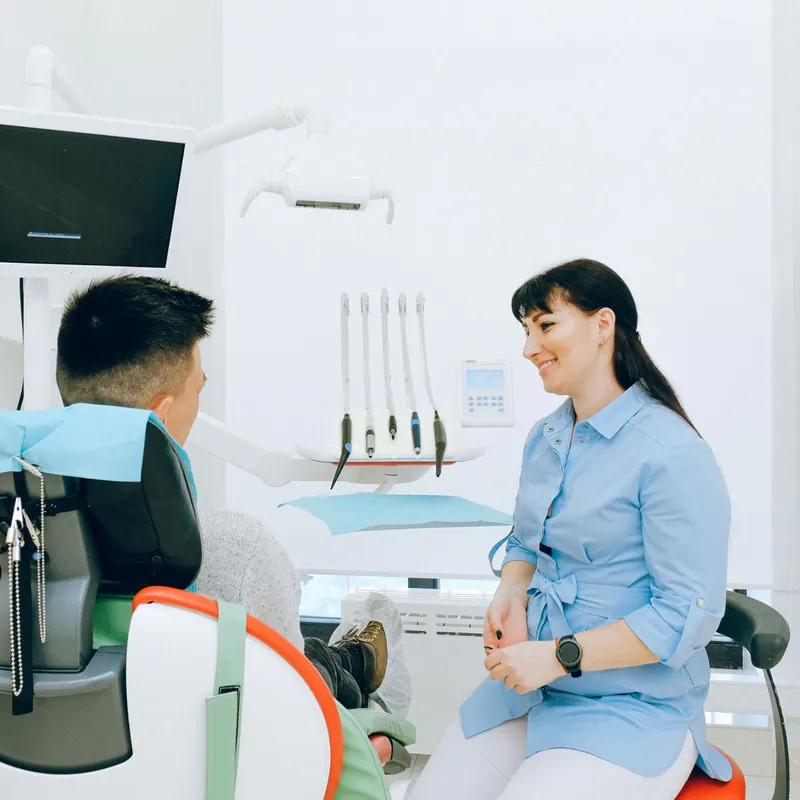 Dentist explaining treatment options to a patient